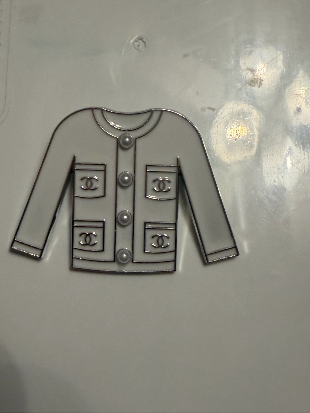 White and Silver Enamel Jacket brooch